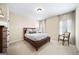 Comfortable bedroom features neutral tones, carpeted floors, and great natural lighting at 2358 New Salem Trce, Marietta, GA 30064