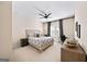 Comfortable bedroom with neutral tones, a ceiling fan, and a large window at 2358 New Salem Trce, Marietta, GA 30064
