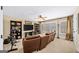 Spacious bonus room has a large screen television and plush reclining furniture at 2358 New Salem Trce, Marietta, GA 30064