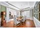 Formal dining room with hardwood floors, a chandelier, and stylish decor at 2358 New Salem Trce, Marietta, GA 30064