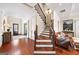 Grand foyer featuring hardwood floors and a staircase with iron railings at 2358 New Salem Trce, Marietta, GA 30064