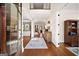 Grand foyer with hardwood floors, high ceilings, and elegant staircase leading to the upper level at 2358 New Salem Trce, Marietta, GA 30064