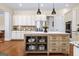 Large kitchen island with custom cabinets and decorative accents at 2358 New Salem Trce, Marietta, GA 30064