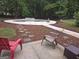 Backyard oasis featuring a luxurious pool and lush landscaping, ideal for relaxation at 3650 Bay Leaf Dr, Loganville, GA 30052