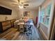 Bedroom featuring a ceiling fan, window with natural light, carpeted flooring and a desk at 3650 Bay Leaf Dr, Loganville, GA 30052