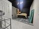 Bedroom featuring tile floors, minimalist style, and modern decor at 3650 Bay Leaf Dr, Loganville, GA 30052