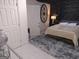 Basement bedroom featuring a stylish accent wall, gray rug, and neutral décor at 3650 Bay Leaf Dr, Loganville, GA 30052