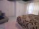 Bedroom with a large bed, plush rug, and natural light, creating a calm ambiance at 3650 Bay Leaf Dr, Loganville, GA 30052
