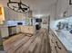Spacious kitchen features white cabinetry, a center island, and stainless steel appliances at 3650 Bay Leaf Dr, Loganville, GA 30052