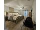 Spacious main bedroom features a ceiling fan, carpeted flooring, and stylish decor and plenty of space at 3650 Bay Leaf Dr, Loganville, GA 30052