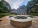 Beautiful in-ground pool and hot tub combination with a spacious deck at 3650 Bay Leaf Dr, Loganville, GA 30052