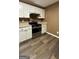 Modern kitchen featuring stainless steel appliances and white cabinets with granite countertops at 4194 Wesley Hall Ln, Decatur, GA 30035