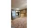 Open-concept kitchen features modern stainless steel appliances and bar top seating at 4194 Wesley Hall Ln, Decatur, GA 30035