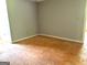 Spacious bedroom with wood subfloor and natural light at 100 Parliament Ct, Fayetteville, GA 30215