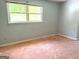 Bedroom with large window providing natural light at 100 Parliament Ct, Fayetteville, GA 30215