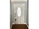Front door with leaded glass design and dented paint at 100 Parliament Ct, Fayetteville, GA 30215