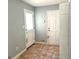 Mudroom doors with some damage on the inside at 100 Parliament Ct, Fayetteville, GA 30215