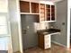 Kitchen featuring granite countertops, white cabinets, tile floors and an area for a refrigerator at 100 Parliament Ct, Fayetteville, GA 30215