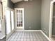 Sunroom featuring tile flooring and plenty of natural light at 100 Parliament Ct, Fayetteville, GA 30215