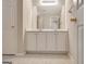 Bathroom features a double sink vanity with a large mirror at 1619 Cascade Overlook, Peachtree City, GA 30269