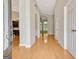 Inviting foyer with hardwood floors, elegant archways, and a view into other rooms at 1619 Cascade Overlook, Peachtree City, GA 30269