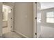 Hallway featuring doors to bathroom and bedroom at 1619 Cascade Overlook, Peachtree City, GA 30269