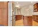 Bright, open kitchen featuring stainless steel refrigerator and island at 1619 Cascade Overlook, Peachtree City, GA 30269