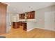 Elegant kitchen includes stainless appliances, granite counters, custom cabinets and eat-in dining at 1619 Cascade Overlook, Peachtree City, GA 30269