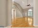 Spacious living room with hardwood floors, a ceiling fan, and a grand staircase at 1619 Cascade Overlook, Peachtree City, GA 30269