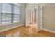 Bright room with hardwood floors and a view of the front door and exterior at 1619 Cascade Overlook, Peachtree City, GA 30269