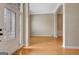 Open-concept space with hardwood floors, neutral colors, and an elegant front entrance view at 1619 Cascade Overlook, Peachtree City, GA 30269