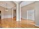 Spacious living room featuring hardwood floors, elegant trim, and ample natural light at 1619 Cascade Overlook, Peachtree City, GA 30269