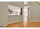 Inviting living space features a view to a kitchen and an elegant staircase to upper level at 1619 Cascade Overlook, Peachtree City, GA 30269