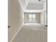 Spacious primary bedroom with tray ceiling and natural light at 1619 Cascade Overlook, Peachtree City, GA 30269