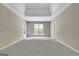 Large main bedroom featuring tray ceiling and big windows at 1619 Cascade Overlook, Peachtree City, GA 30269