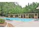 Inviting community pool with sun loungers and a pergola for a serene setting at 1619 Cascade Overlook, Peachtree City, GA 30269
