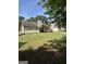 View of the house from the backyard and deck at 12214 Cypress Way, Fayetteville, GA 30215