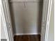 Walk-in closet with wire shelving and hardwood floors at 12214 Cypress Way, Fayetteville, GA 30215