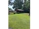 Beautifully maintained green space with a picnic pavilion, perfect for community gatherings at 12214 Cypress Way, Fayetteville, GA 30215