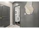 Modern designed bathroom, vanity, vessel sink, and gray accent wall at 1766 Ware Ave, East Point, GA 30344