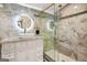 Beautiful bathroom features modern fixtures, stylish tile and a glass shower enclosure at 1766 Ware Ave, East Point, GA 30344
