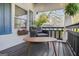 Relaxing covered porch featuring comfortable seating with flower box and nice view at 1766 Ware Ave, East Point, GA 30344