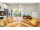 Close up on custom island with a butcher block top, pendant lighting and view to the back yard at 1766 Ware Ave, East Point, GA 30344
