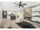 Open living area featuring fireplace, unique accents and flowing floor plan at 1766 Ware Ave, East Point, GA 30344