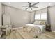 Cozy main bedroom with stylish decor, light-colored walls, and plenty of natural light at 1766 Ware Ave, East Point, GA 30344