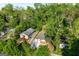 Aerial shot of property surrounded by lush greenery, showcasing the home's location in a desirable neighborhood at 849 Wood Nw St, Atlanta, GA 30318