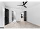 Spacious bedroom offering ample natural light, a ceiling fan and gray carpet at 849 Wood Nw St, Atlanta, GA 30318