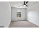 Light-filled bedroom with a modern ceiling fan and a large window at 849 Wood Nw St, Atlanta, GA 30318
