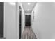 Hallway with LVP flooring that leads to the main entrance and other rooms at 849 Wood Nw St, Atlanta, GA 30318