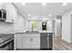 Kitchen features granite countertops, stainless steel appliances, and ample cabinet space at 849 Wood Nw St, Atlanta, GA 30318